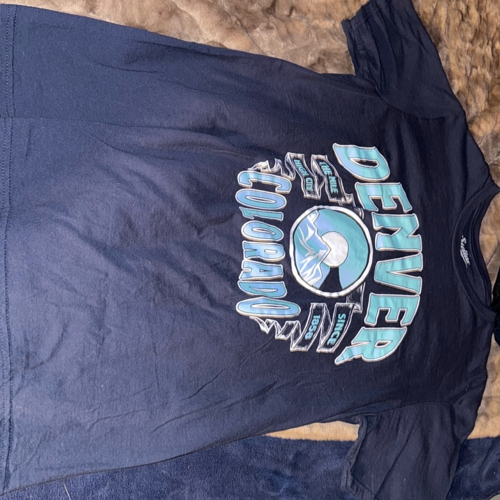 Woman’s M. Blue Denver, Colorado tee.